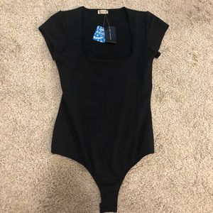 New With Tags. XS Free People Cap Sleeve Body Suit.